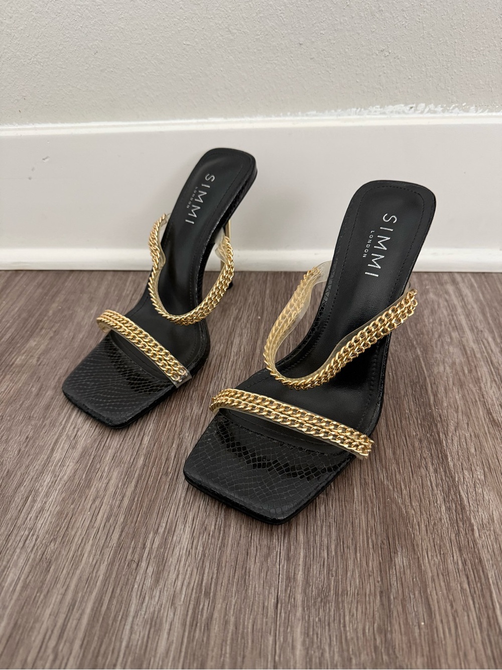 SIMMI London Black Heeled Sandals with Gold Chain Straps